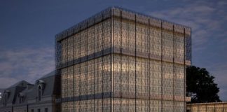 Seconda pelle artistica a maglia di metallo per vestire le geometrie degli edifici