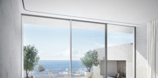 Nuovo scorrevole in alluminio a soglia 0-level progettato per scomparire nella muratura al 99%