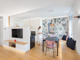 Vienna: 65 mq fluidi e con porte filomuro