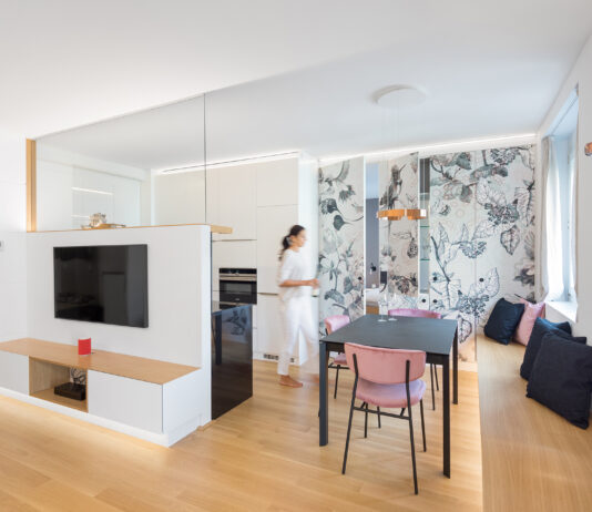 Vienna: 65 mq fluidi e con porte filomuro