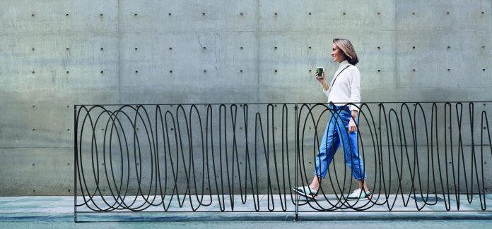 Side,View,Of,Stylish,Positive,Middle,Aged,Female,In,Jeans