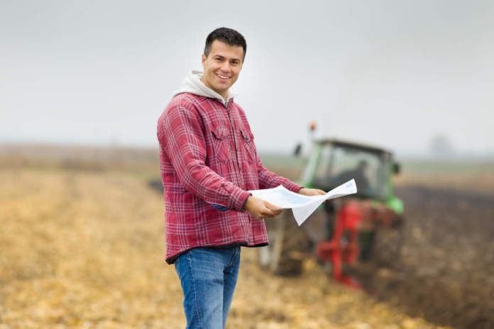 Farmer with bank forms Pac