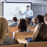 Students listening his lecturer Group of students listening his lecturer - square
